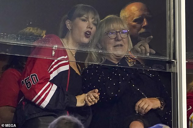 Game on!  Swift pictured with Donna at one of Travis' football games