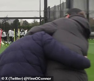 As Klopp spoke to O'Connor during training, he grabbed the reporter in a playful headlock