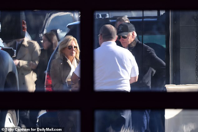 First lady Jill Biden (left) and President Joe Biden (right) talk with first responders at the Nantucket Fire Department