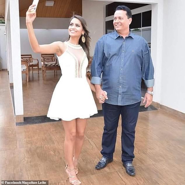 Naçoitan Leite (right), the mayor of Brazil's central city of Iporá, and his wife (left)