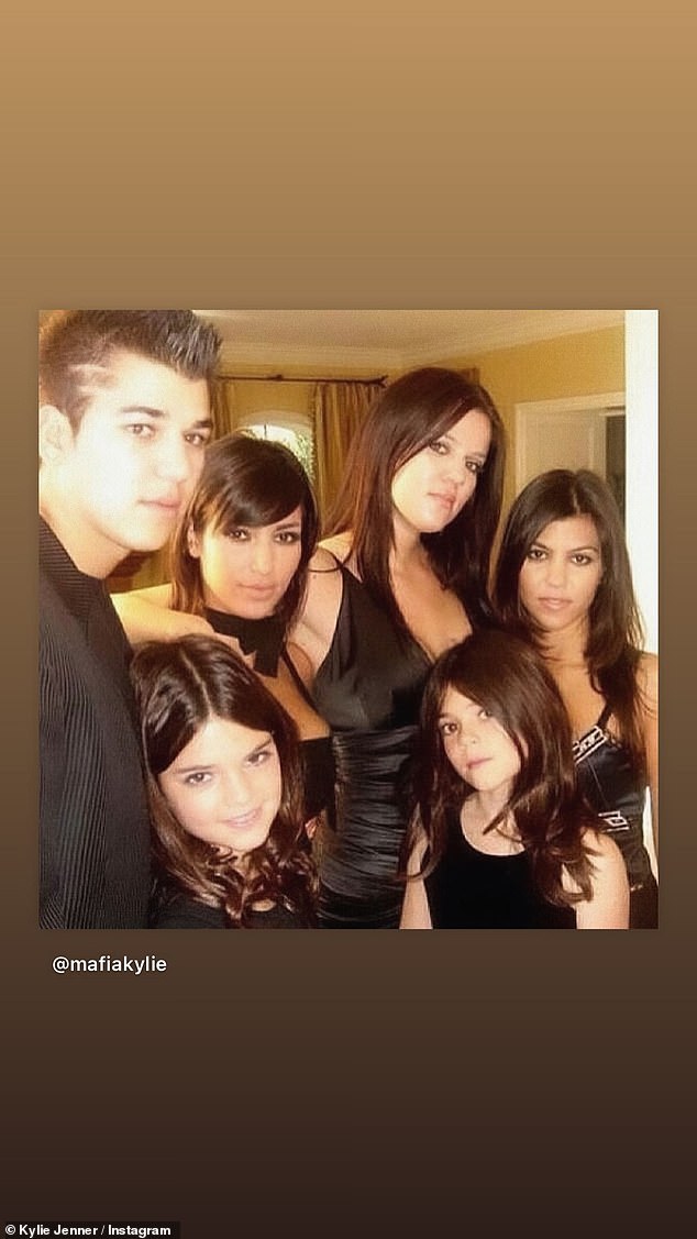 Throwback: Kylie also shared an undated throwback photo of all the siblings on Thanksgiving, along with a glimpse of her Christmas tree