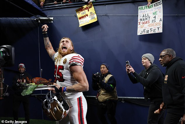 He even threw a turkey leg at a 49ers fan as he celebrated his team's 31-13 win in Seattle.