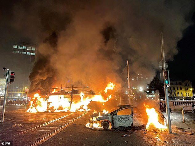A bus and a car were set on fire in Dublin on Thursday evening amid the unrest