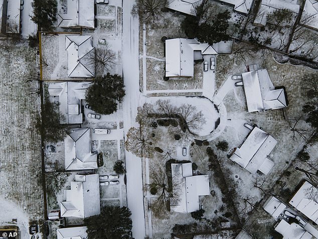 Homes in the Westbury neighborhood are covered in snow in Houston, Texas, when the storm hit in February 2021