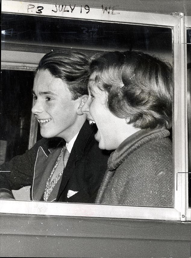 Princess Anne is taken to 'The Sound of Music' in 1961, accompanied by 21-year-old David Penn, Lady Penn's son