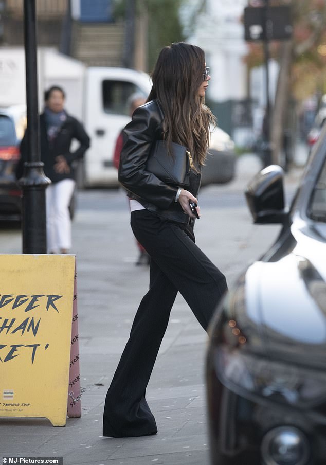 Brunette Beauty: Victoria wore her long and shiny auburn locks loose and tousled to frame her beautiful features