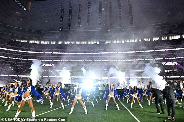 Huge show: Parton performed in front of a group of Cowboys cheerleaders in front of a sold-out crowd