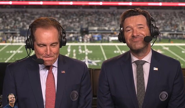 Gushing: Jim Nantz (left) looked uncomfortable as Tony Romo (right) couldn't hide his excitement while discussing Parton's Thanksgiving performance