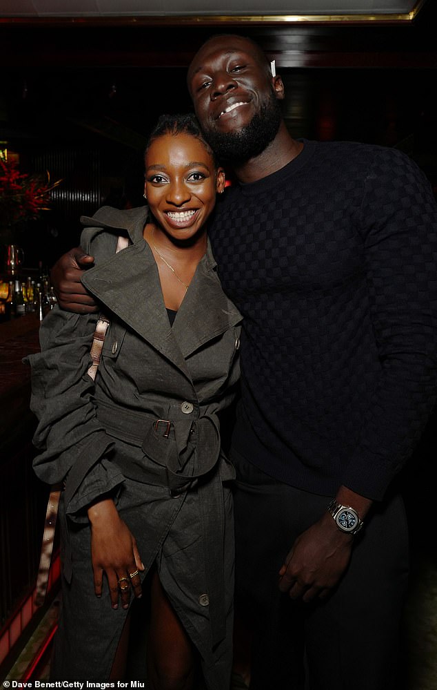 Friends: Stormzy and Little Simz wrapped their arms around each other as they caught up with Miu Miu's star-studded party