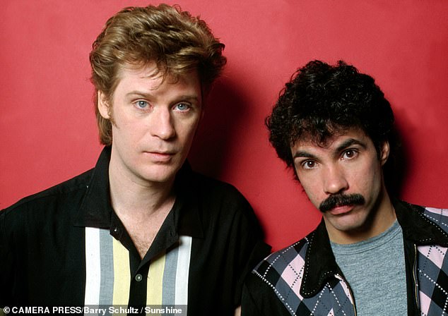 Legal Trouble: TMZ previously revealed that Hall (L) is suing Oates (R) for breach of contract, apparently over who gets to perform their songs, although the file is sealed;  seen in the early 1980s