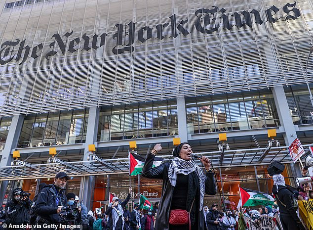 Protesters targeted the New York Times on Thursday as they passed its headquarters