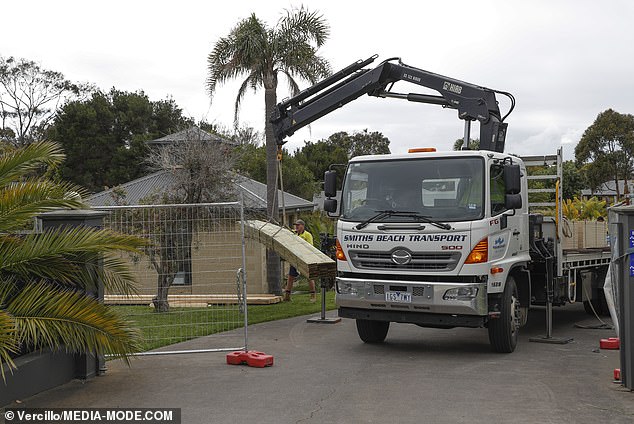 A large truck delivering essential building materials