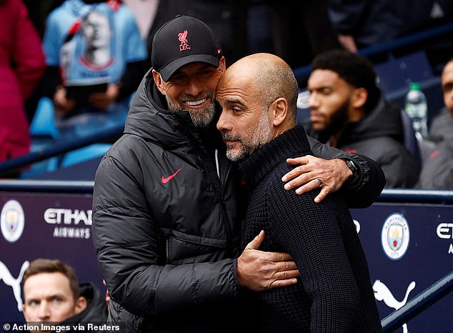 Guardiola (right) was quizzed about Everton as he prepared to face Jurgen Klopp's (left) Liverpool