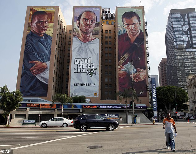 Grand Theft Auto 5 earned Rockstar more than $6 billion in revenue, with Luke's character on the right side of this billboard at the Figueroa Hotel in Los Angeles