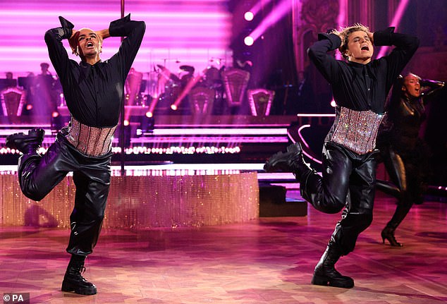 Perfect Couple: Layton and Nikita Kuzmin, 25, are currently the highest grossing couple on Strictly Come Dancing (pictured during their Week 9 performance)