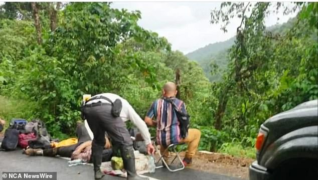 Authorities are treating seriously injured passengers on the road in Peru after the crash