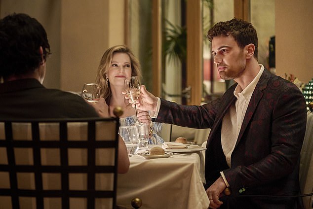 Fahy is pictured in character as Daphne Sullivan alongside Theo James who played her husband Cameron