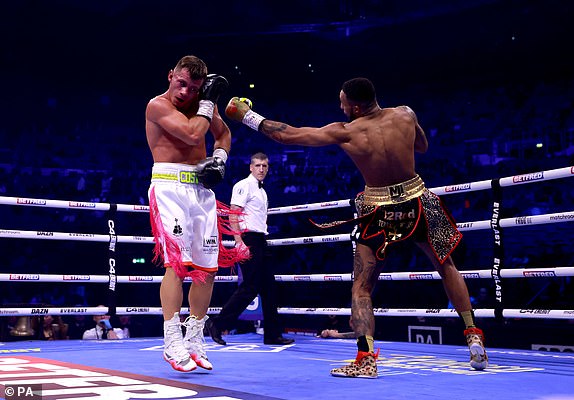 Costin Ion (left) in action against Zelfa Barrett in their Super Featherweight bout at the 3Arena in Dublin, Ireland.  Date of photo: Saturday, November 25, 2023. PA Photo.  See PA story BOXING Dublin.  Photo credits should read as follows: Liam McBurney/PA Wire RESTRICTIONS: Use subject to restrictions.  Editorial use only, no commercial use without prior permission from the rights holder.