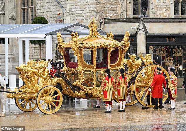 Built in 1760, the Gold State Coach has been used at every coronation since that of William IV in 1831 and waits outside Westminster Abbey during the coronation of King Charles III and Queen Camilla on May 6, 2023 in London