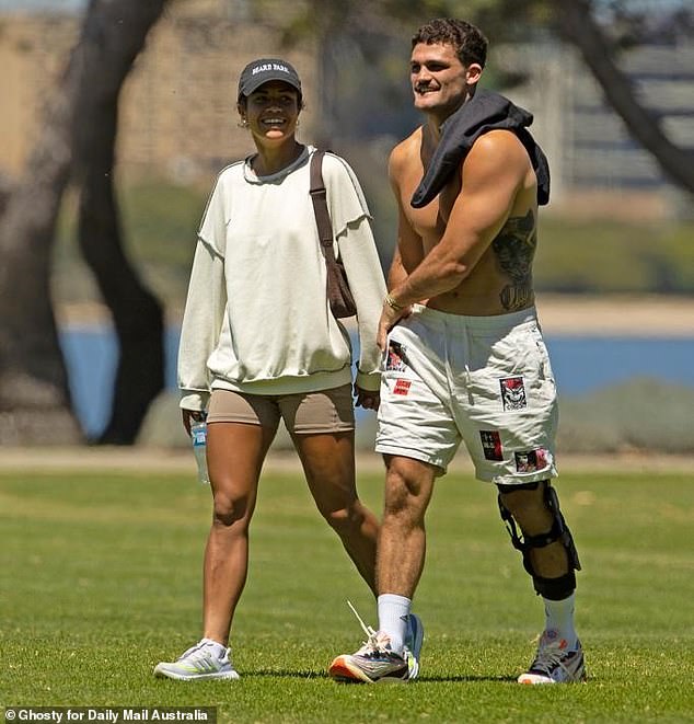 The couple's romance became public when Daily Mail Australia exclusively captured photos of them sharing some tender moments in a Perth park on October 31 (pictured)