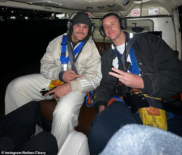 The premiership-winning halfback enjoyed a nighttime helicopter flight over Manhattan during his action-packed off-season holiday (pictured)