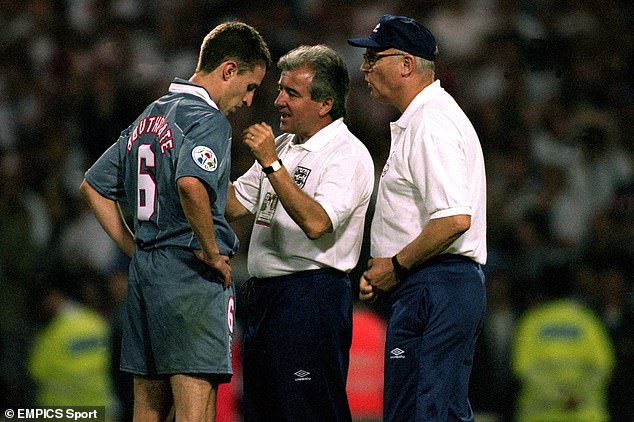 Venables consoles Gareth Southgate (left) after his penalty miss in the shoot-out against Germany at Wembley cost England a place in the final