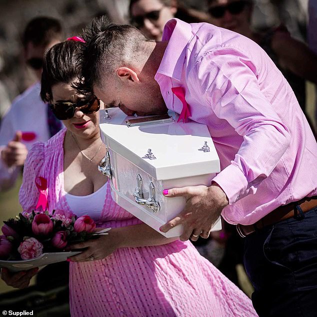 It has taken Matt McConnell (pictured at his daughter's funeral) 18 months to come to terms with his grief after the heartbreaking loss of baby Wren when he was eight days old