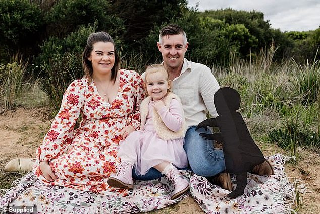 Family photos always show a shadow (right) in memory of baby Wren