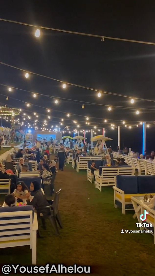 Another clip shows people sitting and eating in an outdoor seating area in the evening