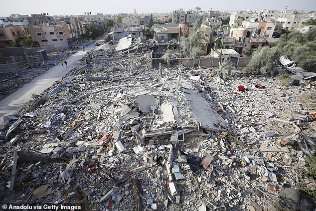 An aerial view of building wreckage following Israeli attacks during the third day of the humanitarian pause in Khan Yunis