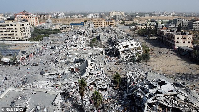 Residential buildings destroyed in Israeli attacks during the conflict amid a temporary ceasefire between Israel and the Palestinian Islamist group Hamas, in southern Gaza City