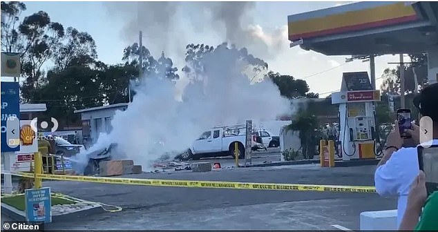 Around 3 p.m. Friday, the stolen car fled Long Beach when it encountered a white truck making a left turn into an intersection.  The crash is so intense that the vehicles are sent straight into a gas station and ultimately a bollard, with the impact causing it to fall down