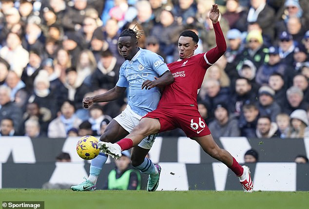 The Liverpool right back had his hands full with Man City winger Jeremy Doku