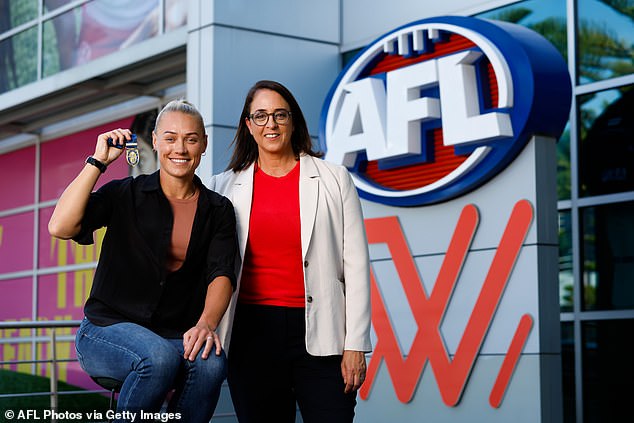 The 52-year-old (pictured with AFLW great Erin Phillips), an Olympic medalist for Australia in the pool, was a driving force in revolutionizing the women's Aussie Rules