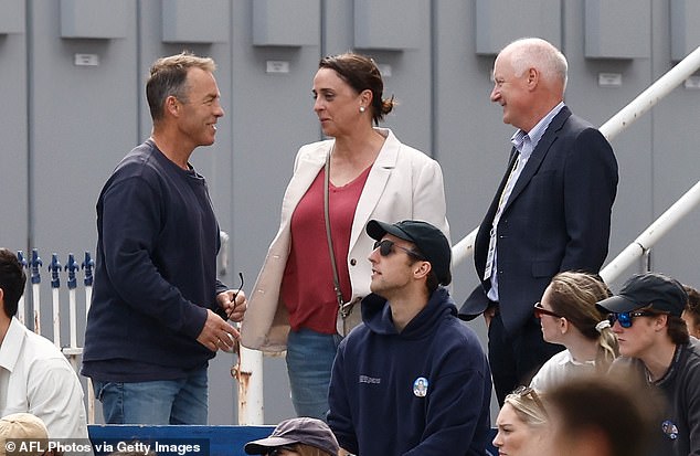 The 52-year-old (pictured with North Melbourne coach Alistair Clarkson and AFL committee chairman Richard Goyder) has not revealed her plans after quitting footy