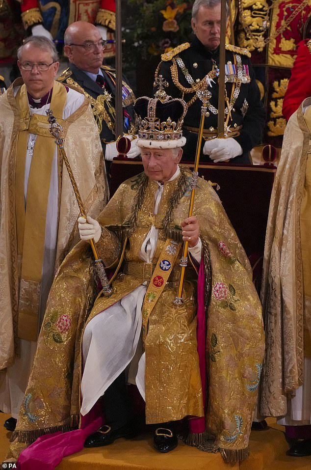 King Charles III is depicted sitting in the St. Edward's Chair, also known as the Coronation Chair