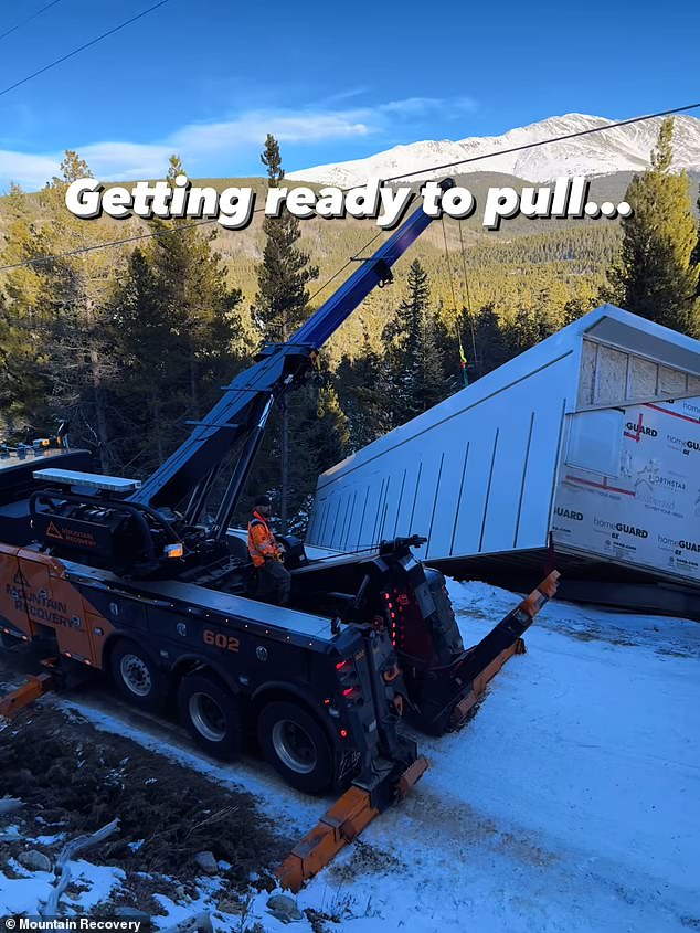 Colorado mountain rescuers managed to save a house that had slid off an icy cliff when a semi-trailer truck moving it struck a blade