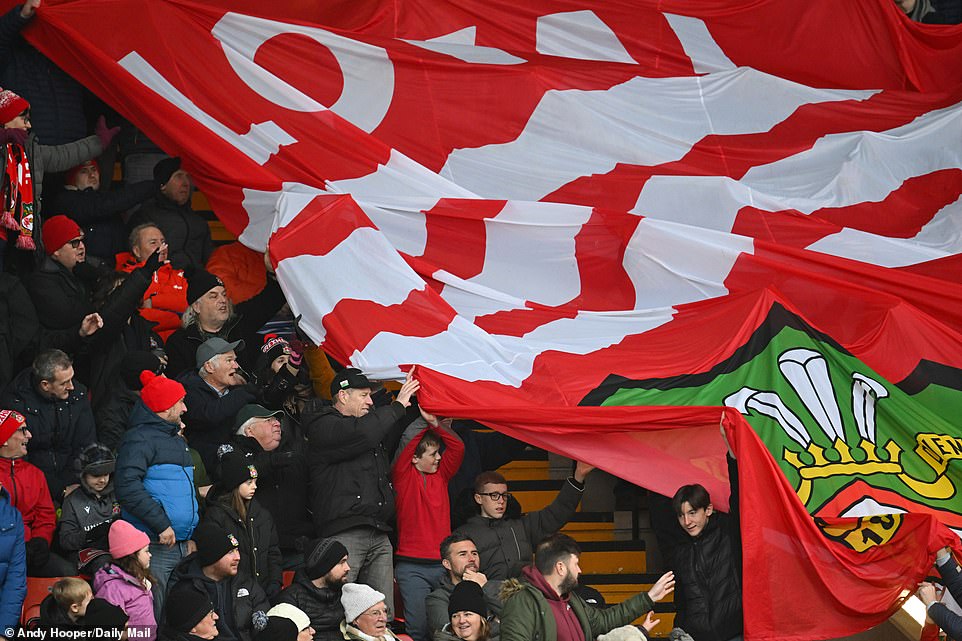 Fans loved to celebrate this during the match, by parading a bright red and white flag in the team's colors