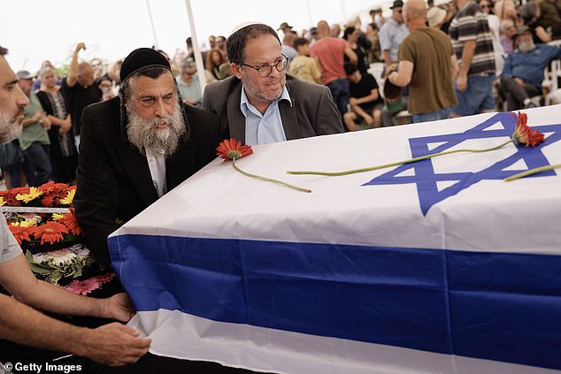 Mourners attend Yonat Or's funeral at Palmachim Cemetery on October 29, 2023 in Kibbutz Palmachin, Israel.  Ms. Or was killed in the attacks on Kibbutz Be'eri on October 7