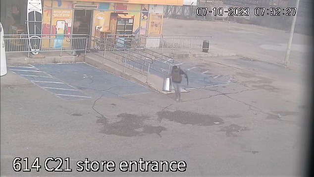 Time codes show the senseless looting lasted two minutes before the terrorists ran out of the store - one of them carrying his loot in a metal trash can