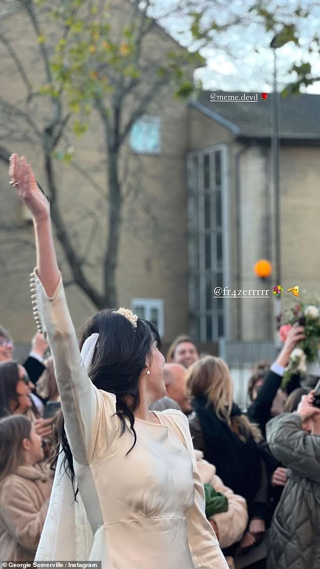 Throwing the bouquet: There was a bit of a fuss when the model threw her flowers in the air