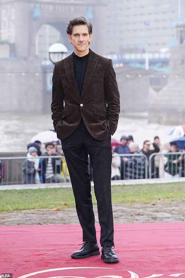 Happy: Matthew Baynton looked sharp for the event, which took place against the backdrop of London's famous Tower Bridge