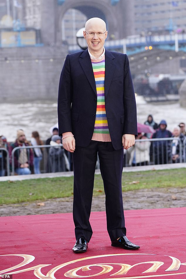 Radiant: Matt Lucas opted for a colorful striped sweater and a dark blue pantsuit