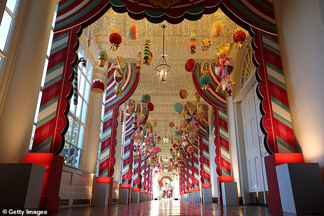 Candy-themed ornaments hang at the entrance