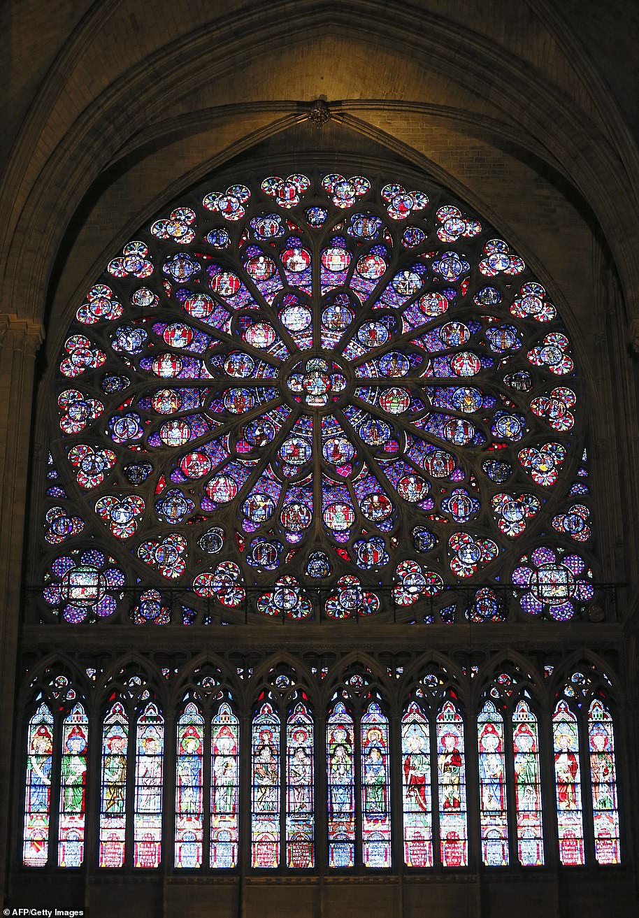 A view of the medieval stained glass rosace on the south side of Notre-Dame de Paris Cathedral