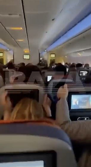 Passengers talked anxiously among themselves as the plane began to shake