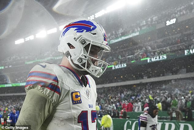 A disappointed Josh Allen walks off the field after falling short in overtime