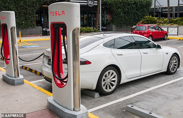 Australian states have introduced significant fines for drivers who leave petrol or diesel vehicles in areas designated for electric cars (stock image pictured)