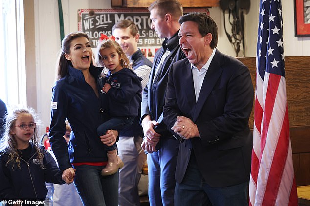 DeSantis has committed to the “full Grassley,” which refers to longtime Iowa Sen. Chuck Grassley and campaigns in all 99 counties in the Hawkeye State.  Pictured: Ron DeSantis, Florida first lady Casey DeSantis and their three children Madison, 6, Mason, 5, and Mamie, 3, attend a campaign event on November 7, even in Davenport, Iowa