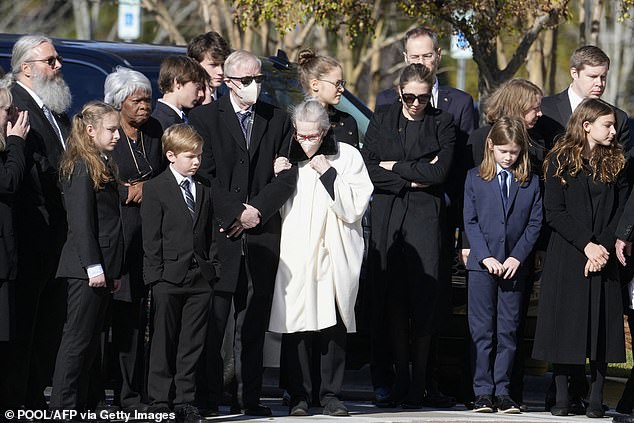 Members of Rosalynn and Jimmy Carter's family gathered Monday at the Phoebe Sumter Medical Center in Americus, Georgia, as the former first lady's casket left for Atlanta — where her body will lie at rest at the Jimmy Carter Presidential Library.